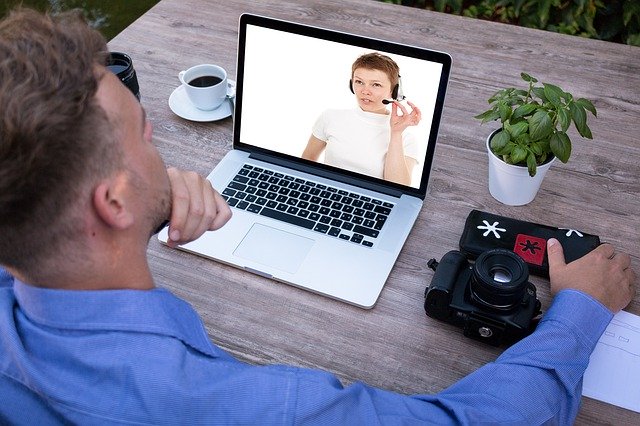Photo of a man and woman on a video chat