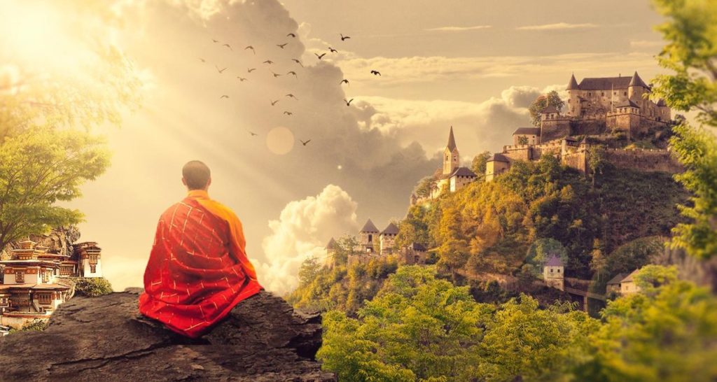 Picture of a monk in a beautiful scene