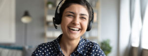 Laughing woman wearing headset